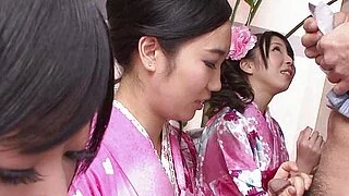 Three geishas sucking on one lonely cock